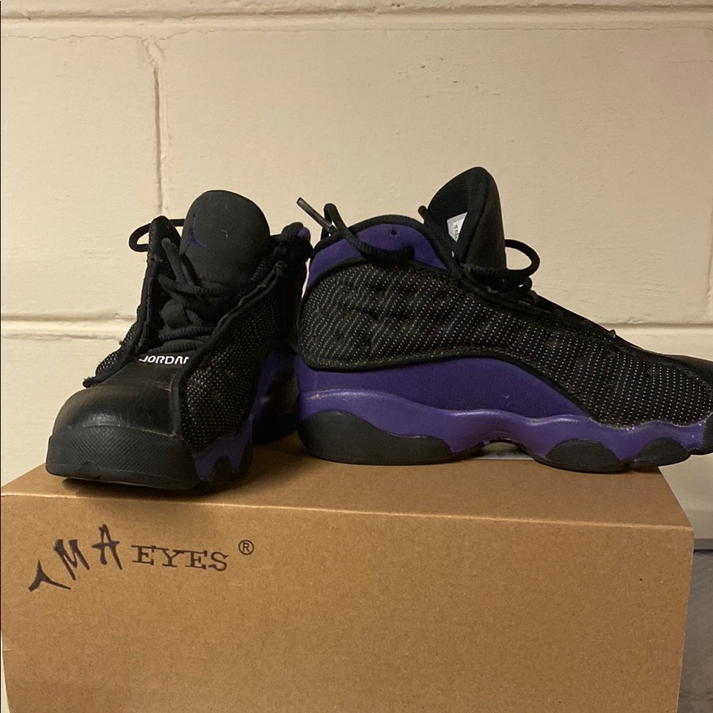 Jordan Black and Purple Sneakers Athletic Design